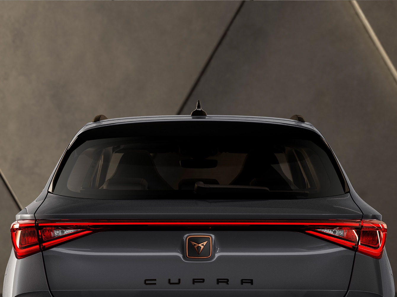 Infinite rear light of the new CUPRA Leon Sportstourer ehybrid Family Sports Car in graphene